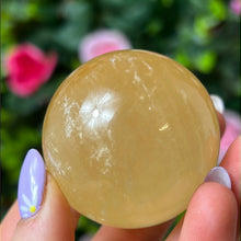 Load image into Gallery viewer, Honey Calcite - yellow optical calcite Sphere
