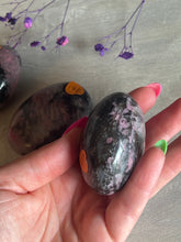 Load image into Gallery viewer, Rhodonite / Rubelleite in Quartz Palm
