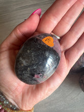 Load image into Gallery viewer, Rhodonite / Rubelleite in Quartz Palm
