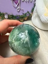 Load image into Gallery viewer, Feather Snowflake Fluorite Sphere
