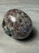 Load image into Gallery viewer, Rhyolite flower in African green jasper Skull
